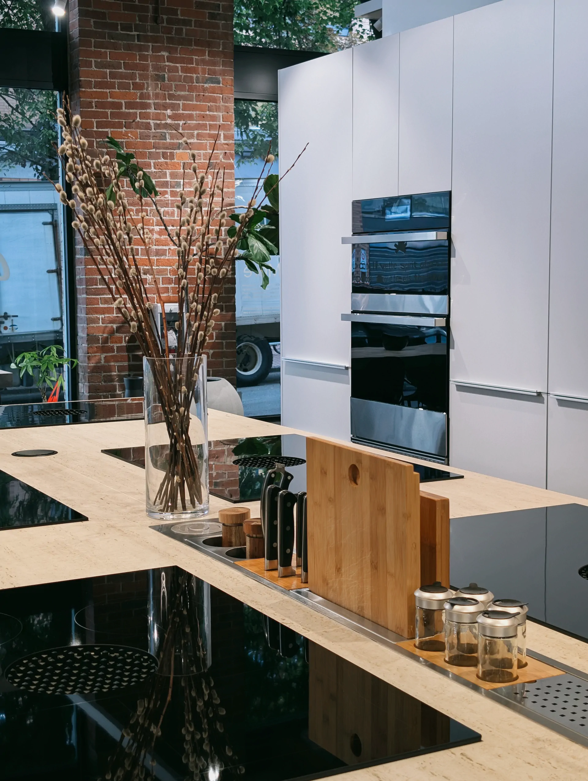 JennAir downdraft cooktop installed in a kitchen island at KI Atelier