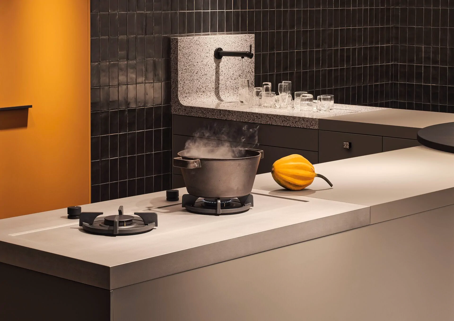 Poggenpohl +VENOVO kitchen detail showing side-frame construction, smooth surfaces, and tiered storage elements