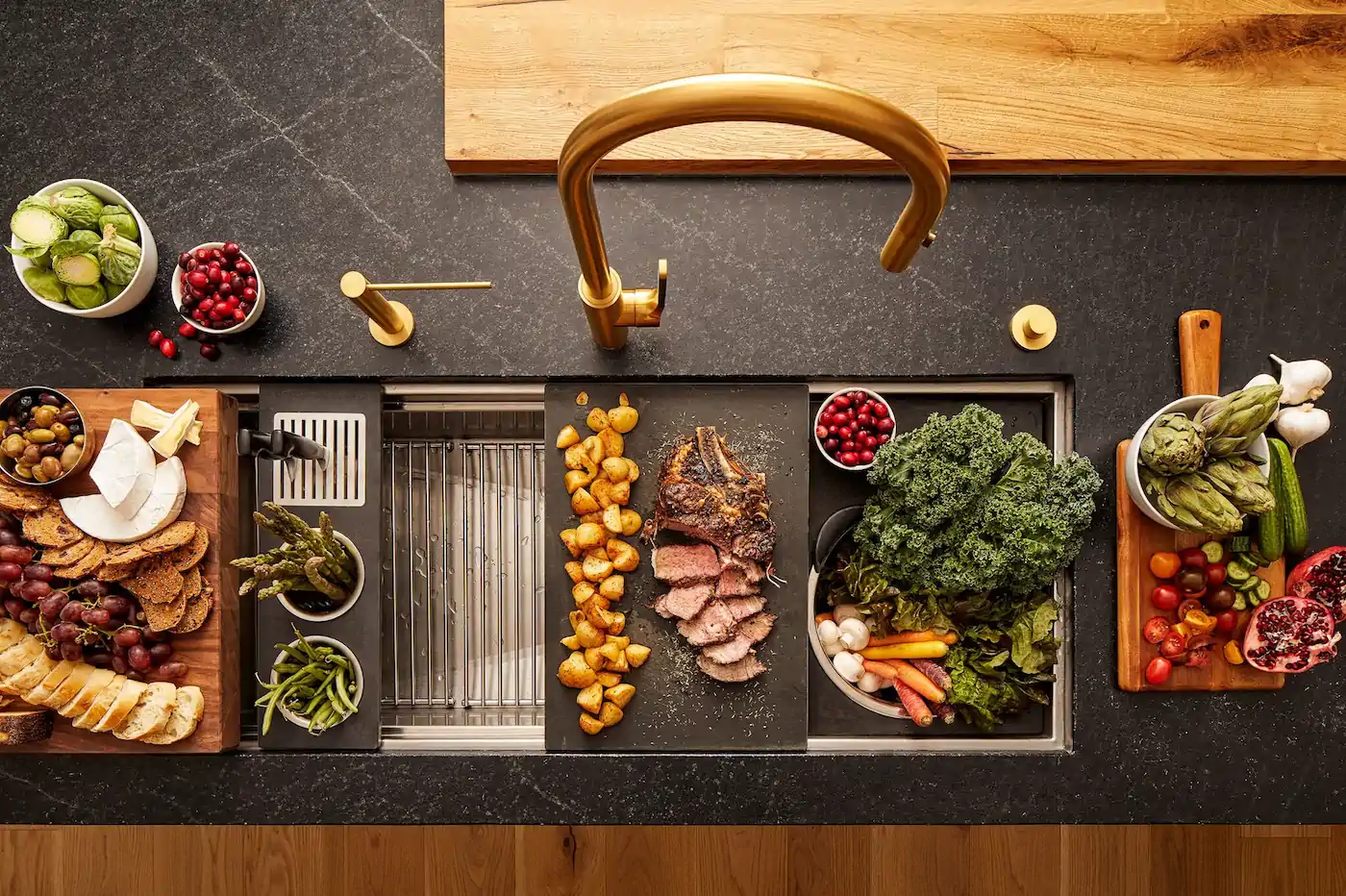 The Galley Workstation with tap, culinary kit tools, and food preparation surfaces